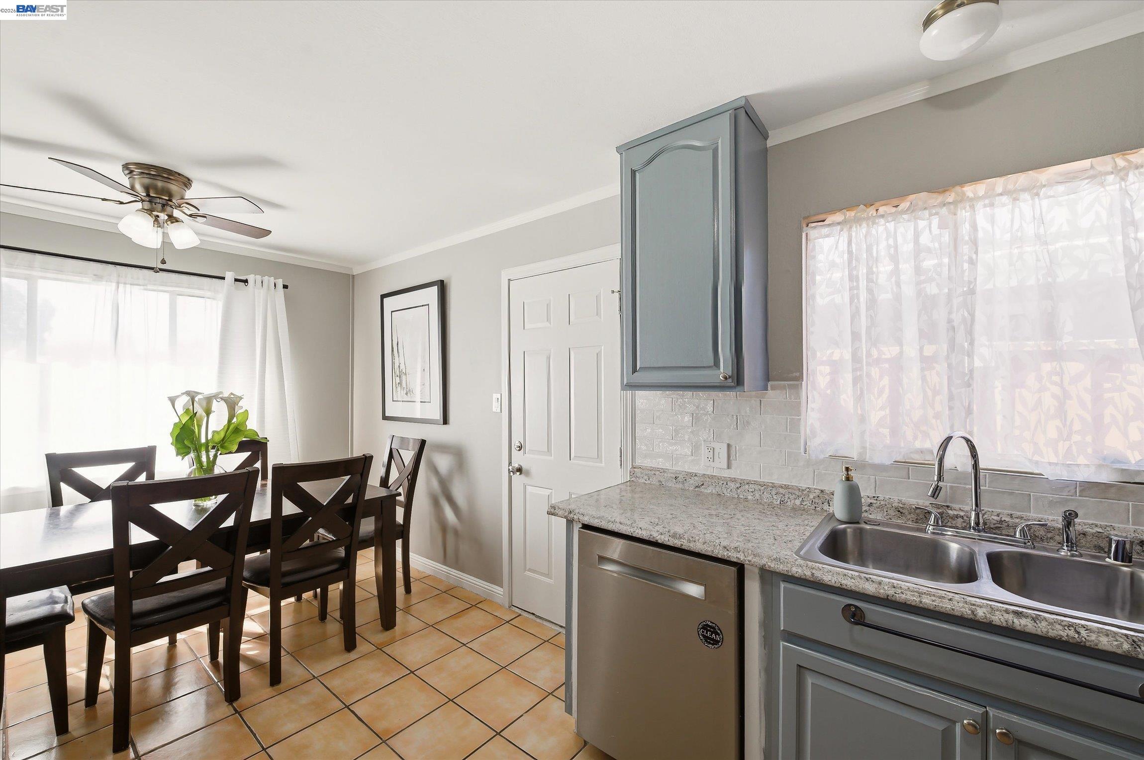 442 James Street Livermore, CA 94551 - Photo 8 of 28 a kitchen with a table chairs and cabinets