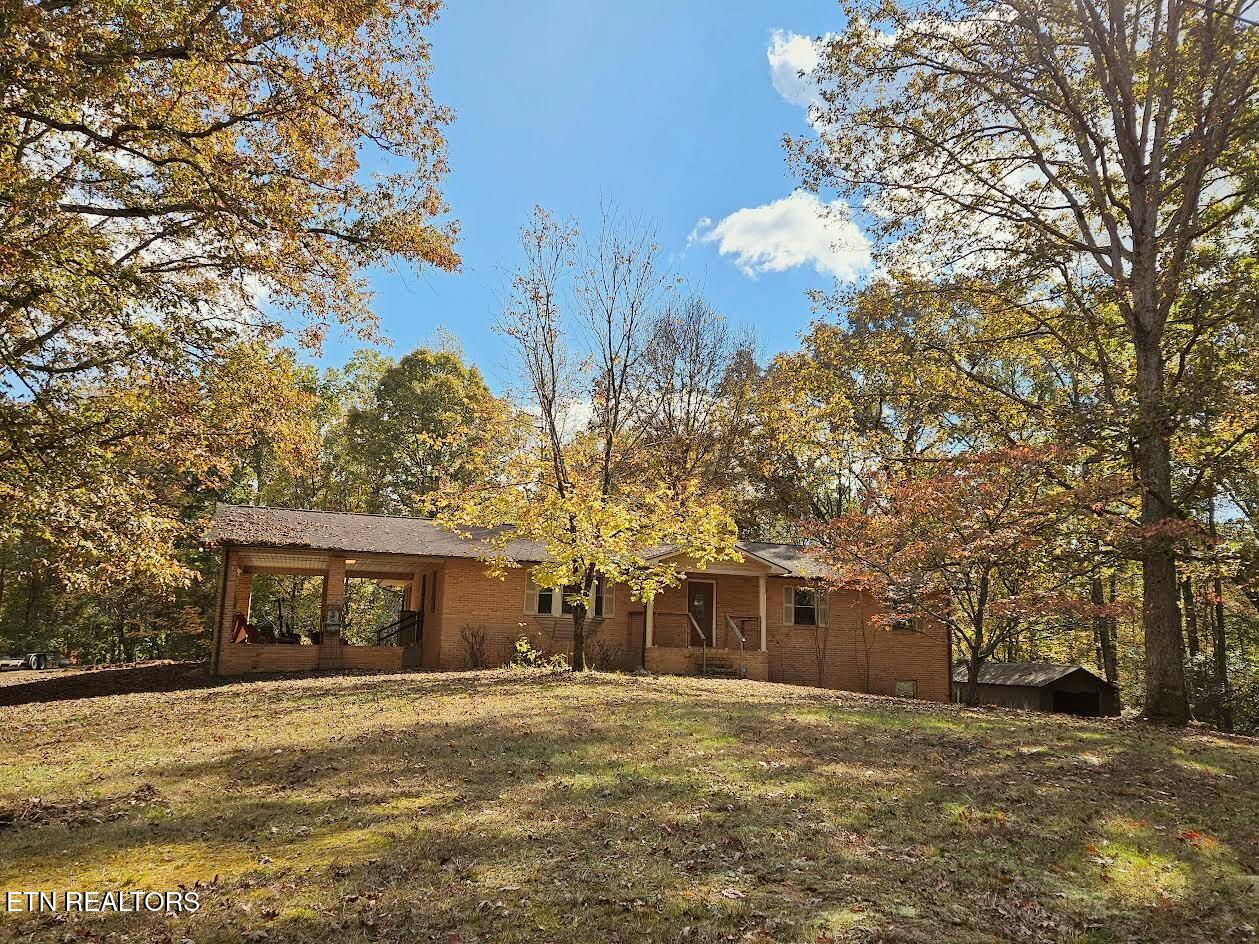 240 West Rockwood Ferry Road Ten Mile, TN 37880 - Photo 2 of 29 Front view from street - carport end