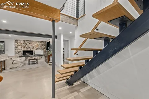 a view of living room with furniture and floor to ceiling window