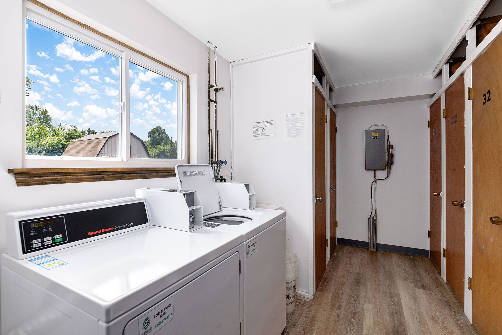 912 South Plum Grove Road, Unit 121 Palatine, IL 60067 - Photo 11 of 11 a kitchen with a refrigerator and a window