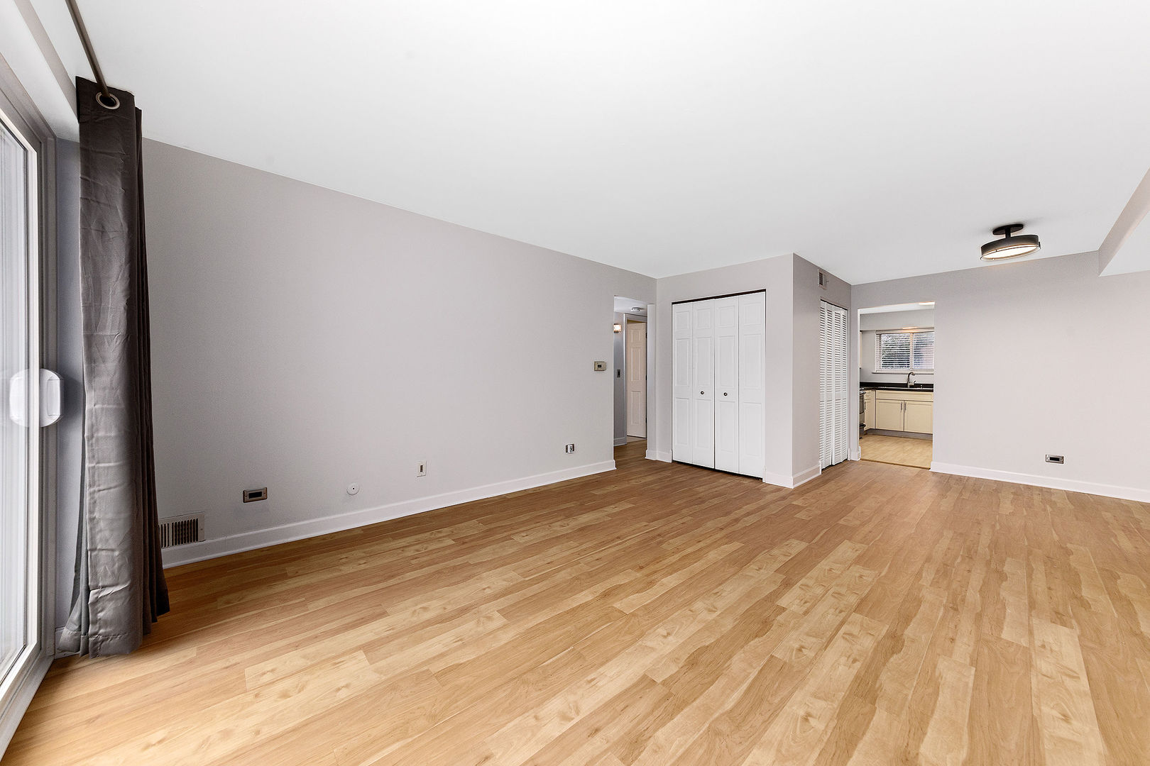 912 South Plum Grove Road, Unit 121 Palatine, IL 60067 - Photo 7 of 11 a view of empty room with wooden floor
