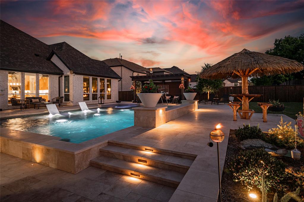 1920 Lotus Court Haslet, TX 76052 - Photo 2 of 40 Another view of the beautiful backyard paradise. Imagine relaxing here while enjoying family and entertaining guests!