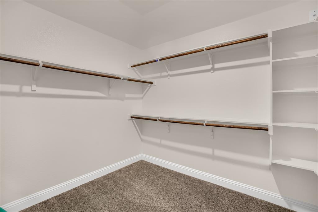 3616 Pinto Way Aubrey, TX 76227 - Photo 27 of 38 a view of an empty walk in closet
