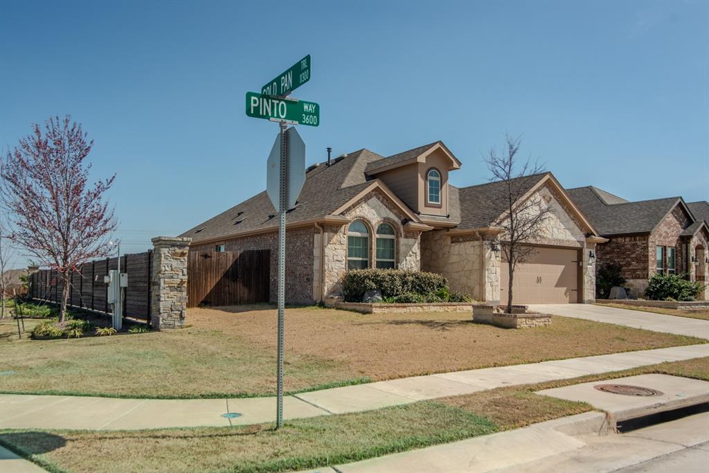 3616 Pinto Way Aubrey, TX 76227 - Photo 32 of 38 a front view of a house with a yard