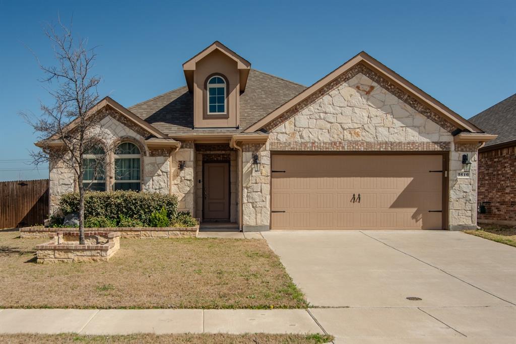 3616 Pinto Way Aubrey, TX 76227 - Photo 33 of 38 a front view of a house with garden