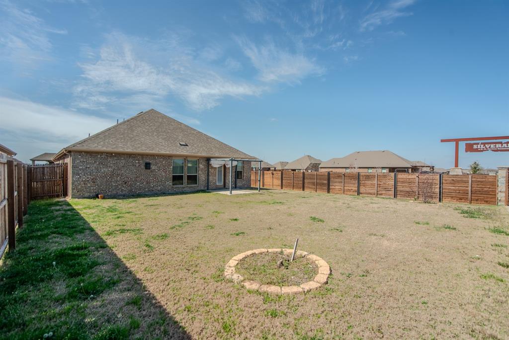 3616 Pinto Way Aubrey, TX 76227 - Photo 36 of 38 a front view of a house with a yard