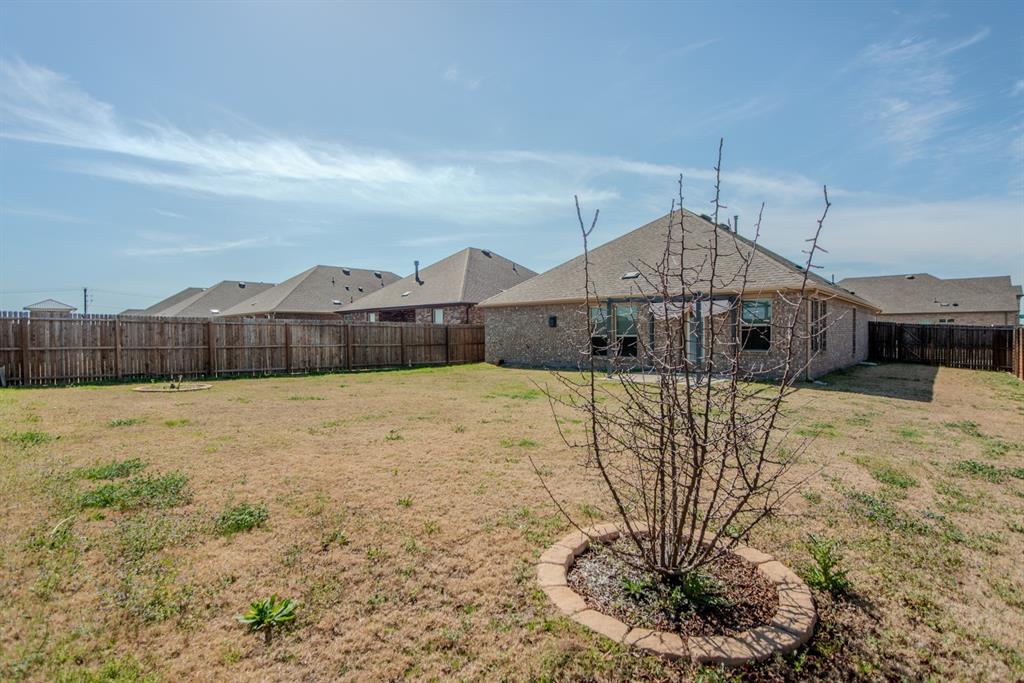 3616 Pinto Way Aubrey, TX 76227 - Photo 37 of 38 a front view of a house with a yard