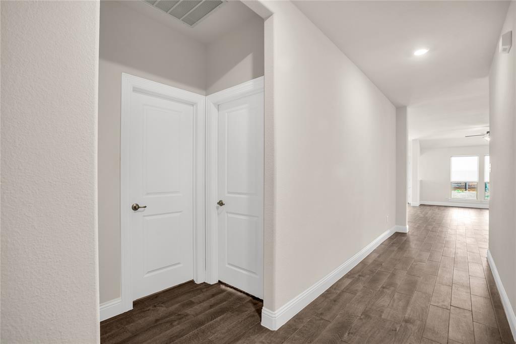 3616 Pinto Way Aubrey, TX 76227 - Photo 8 of 38 a view of empty room with wooden floor