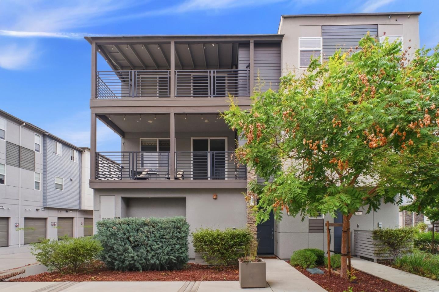 385 Line Street Hayward, CA 94544 - Photo 1 of 38 a view of building with a tree front of house
