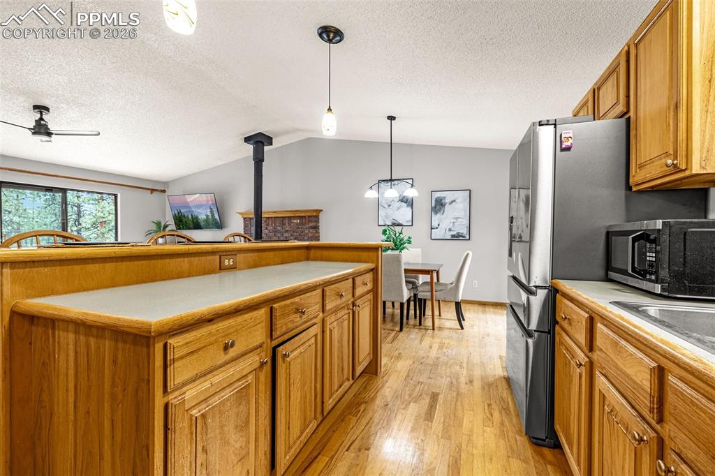 15845 Roller Coaster Road Colorado Springs, CO 80921 - Photo 9 of 29 a very nice looking kitchen with a large window