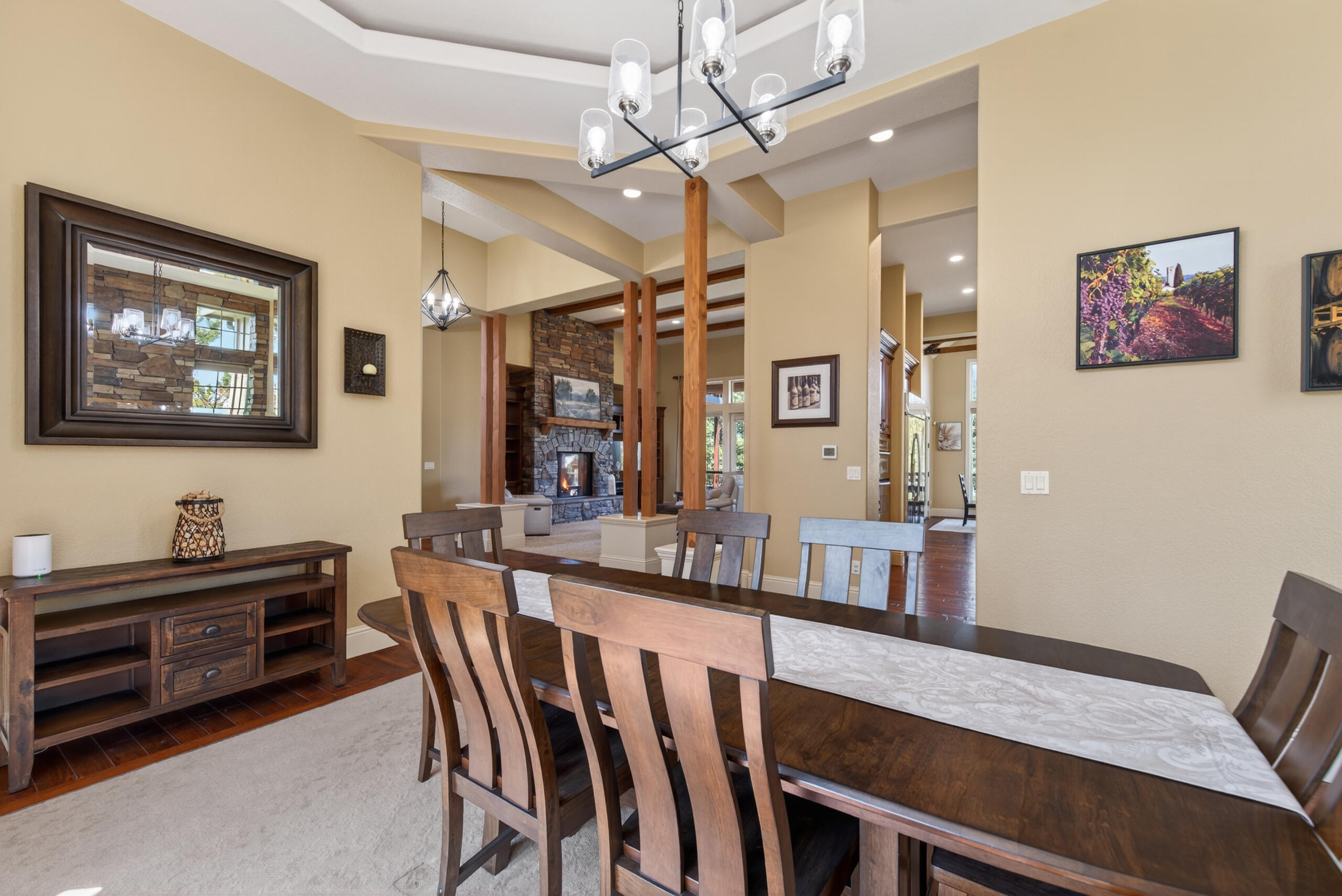 9009 Merlin Drive Redmond, OR 97756 - Photo 24 of 98 a view of a dining room with furniture and a chandelier