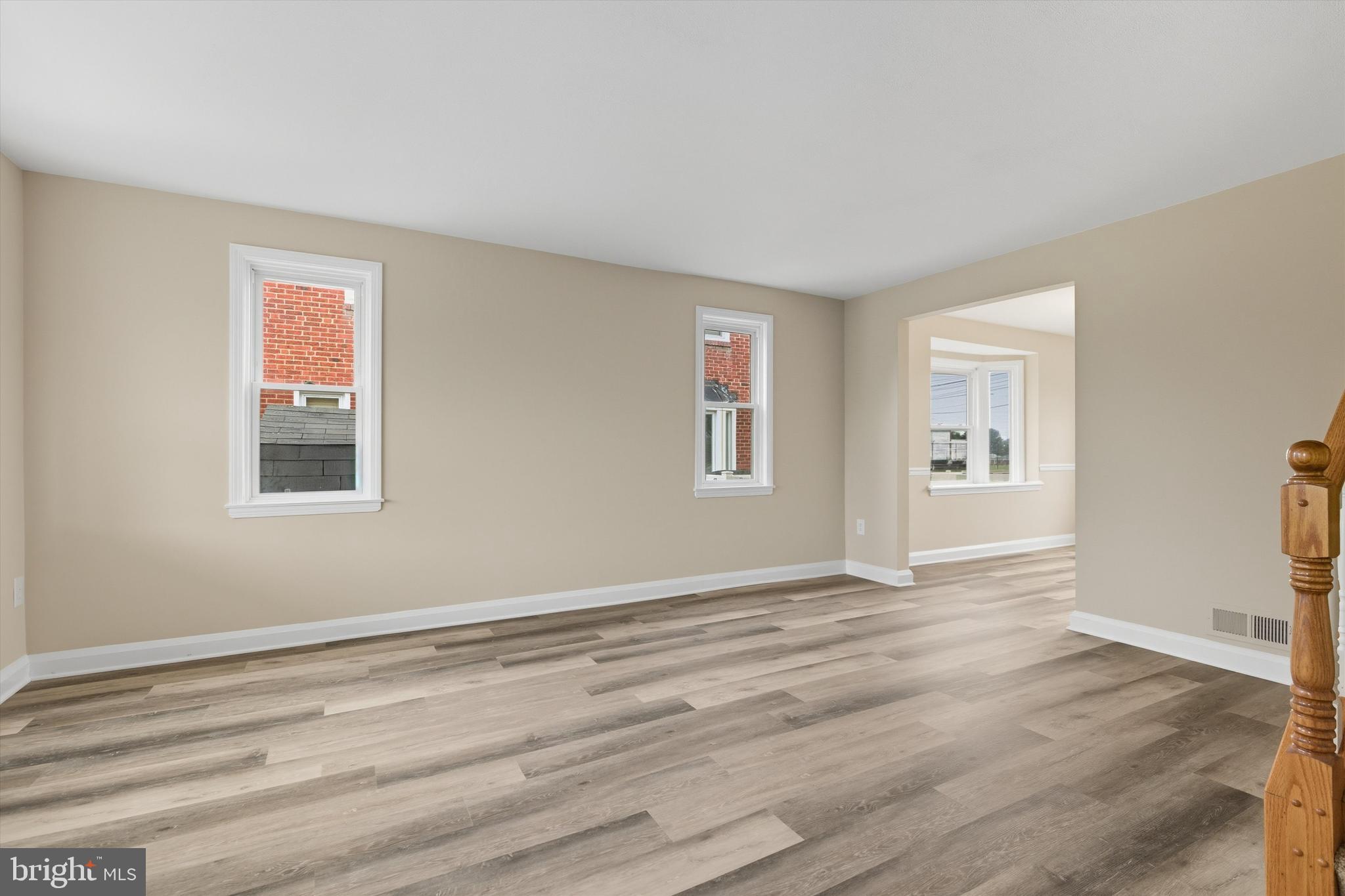 7948 Kavanagh Road Baltimore, MD 21222 - Photo 5 of 26 a view of an empty room with closet and a window