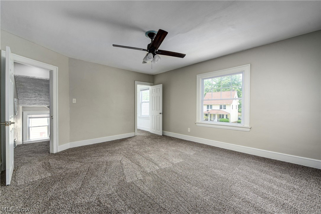 2115 Marlindale Road Cleveland Heights, OH 44118 - Photo 12 of 19 Carpeted spare room featuring ceiling fan