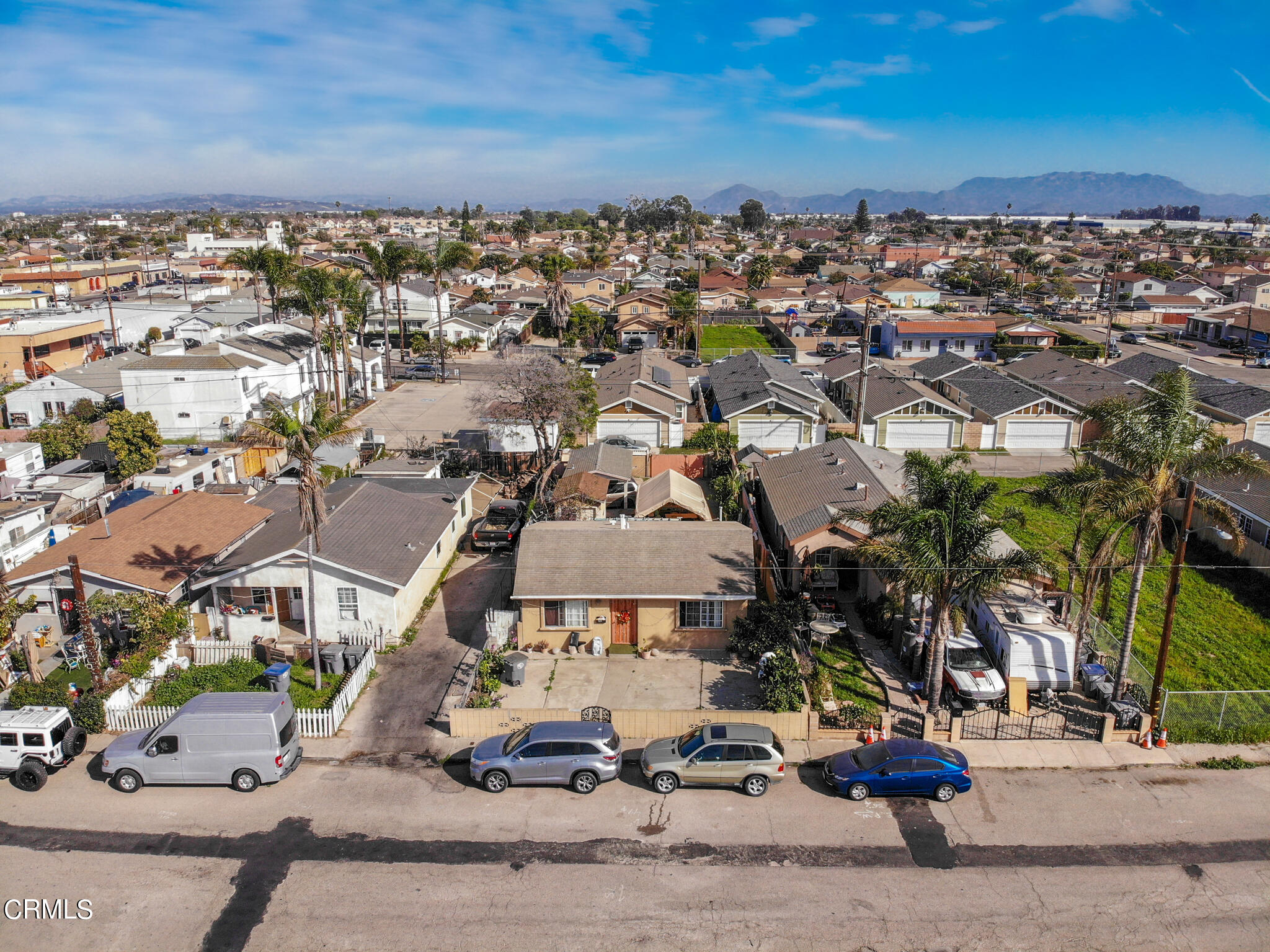 128 North Harrison Avenue Oxnard, CA 93030 - Photo 6 of 10 an aerial view of multiple houses with yard
