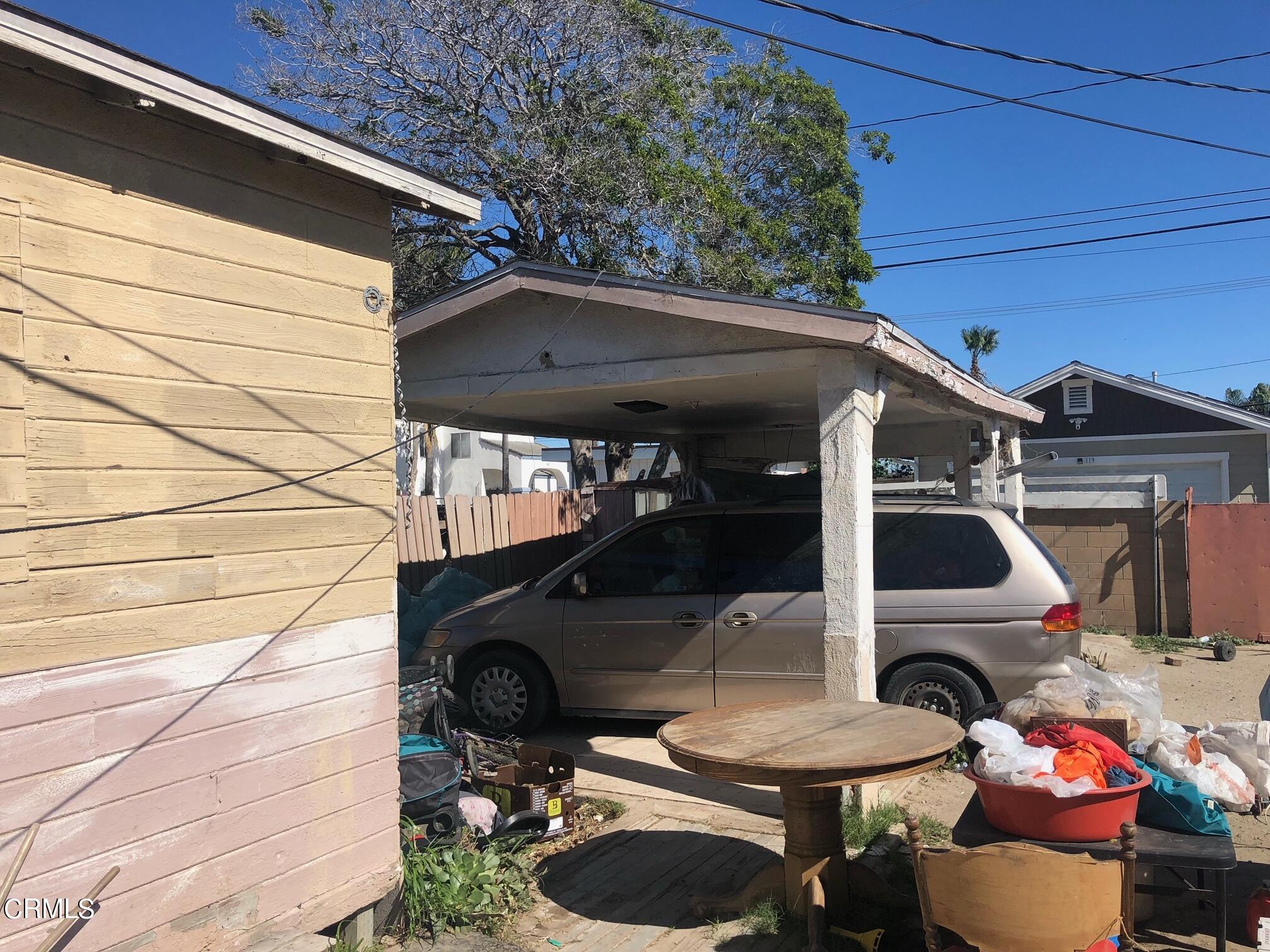 128 North Harrison Avenue Oxnard, CA 93030 - Photo 8 of 10 a side view of a house with patio