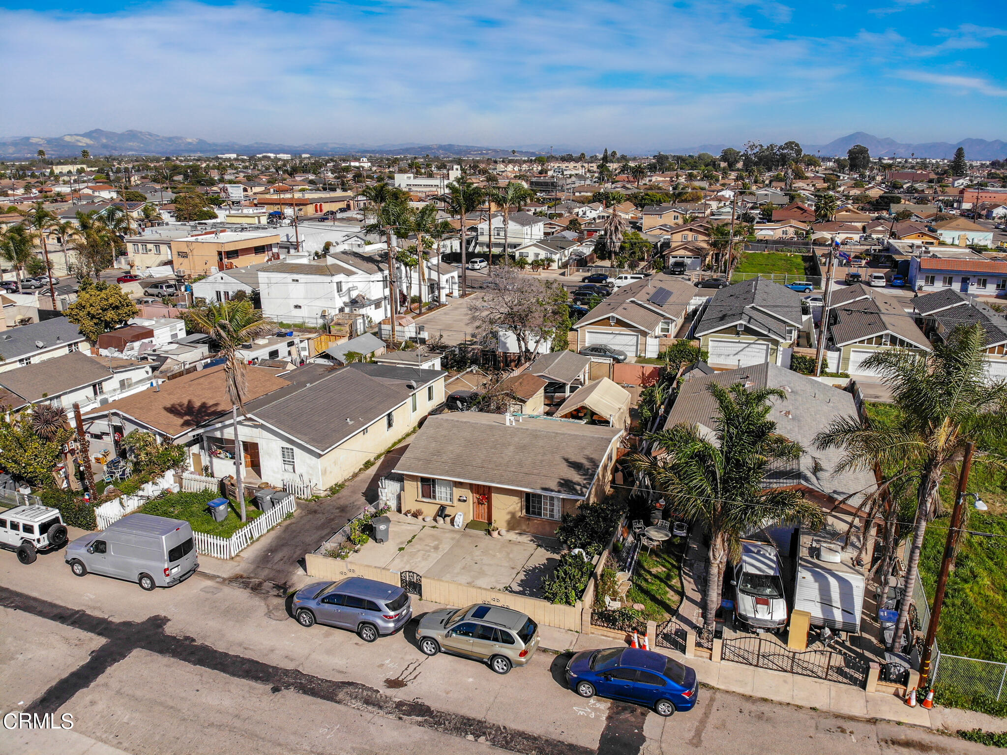 128 North Harrison Avenue Oxnard, CA 93030 - Photo 9 of 10 an aerial view of residential houses with outdoor space