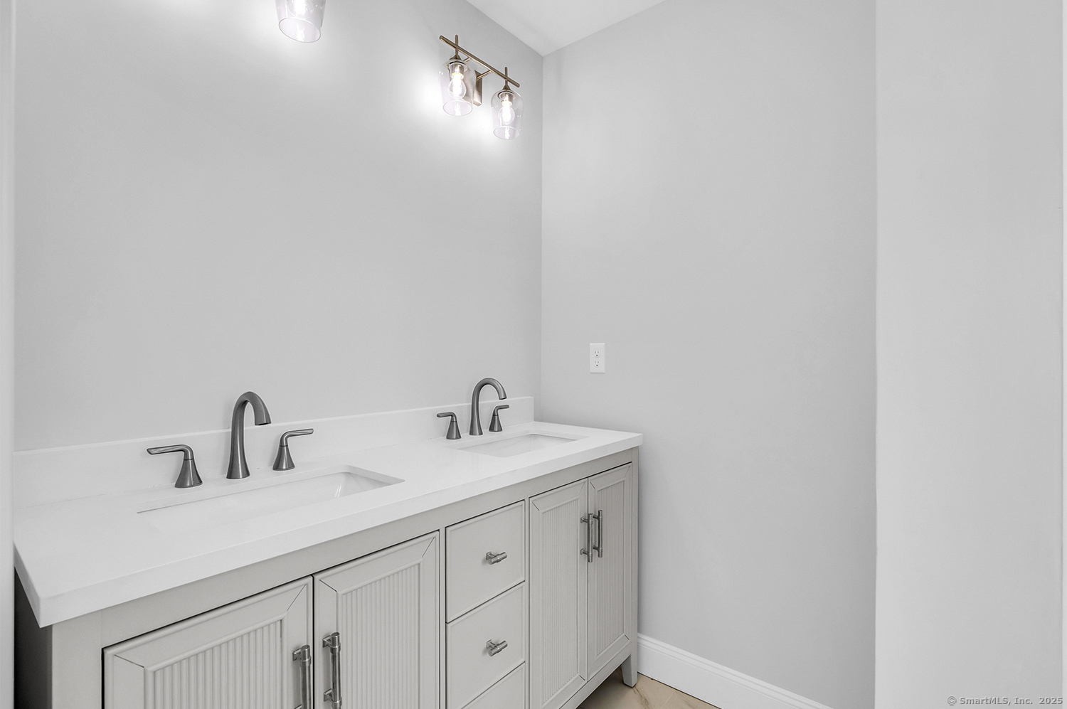 197 Vesper Street Fairfield, CT 06825 - Photo 12 of 21 a bathroom with a sink and a mirror