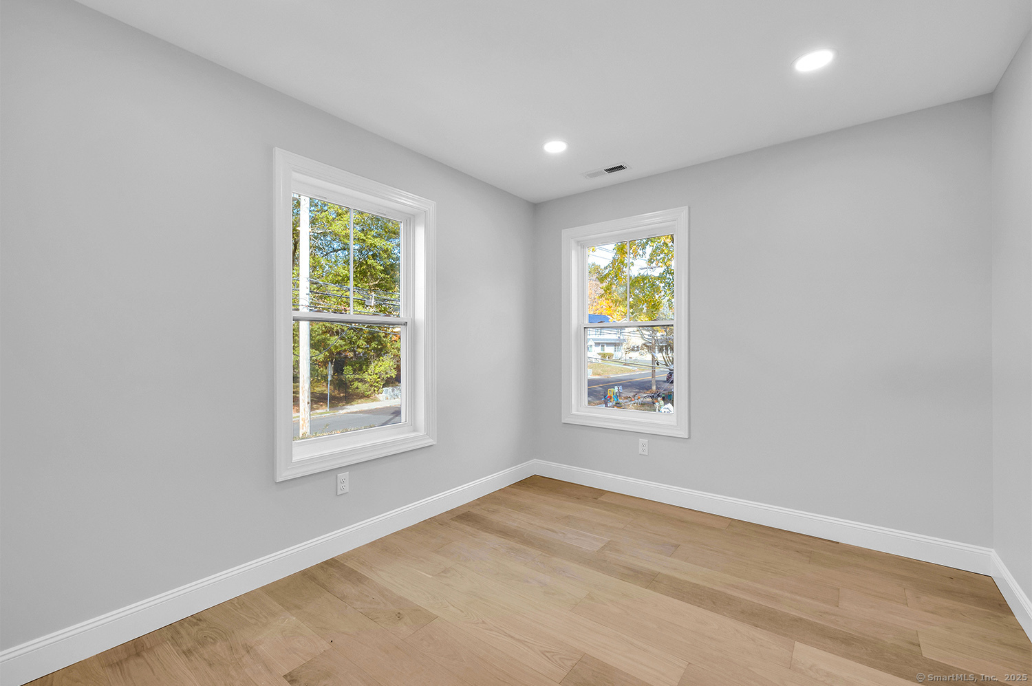197 Vesper Street Fairfield, CT 06825 - Photo 14 of 21 an empty room with window and mirror fan