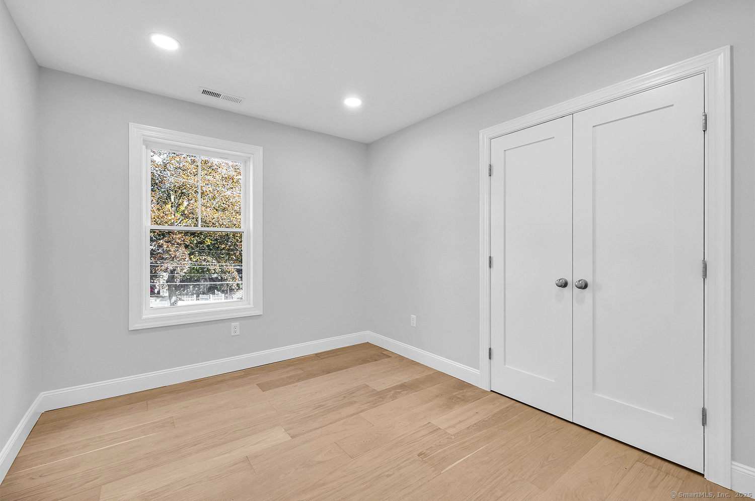 197 Vesper Street Fairfield, CT 06825 - Photo 15 of 21 a view of empty room with window