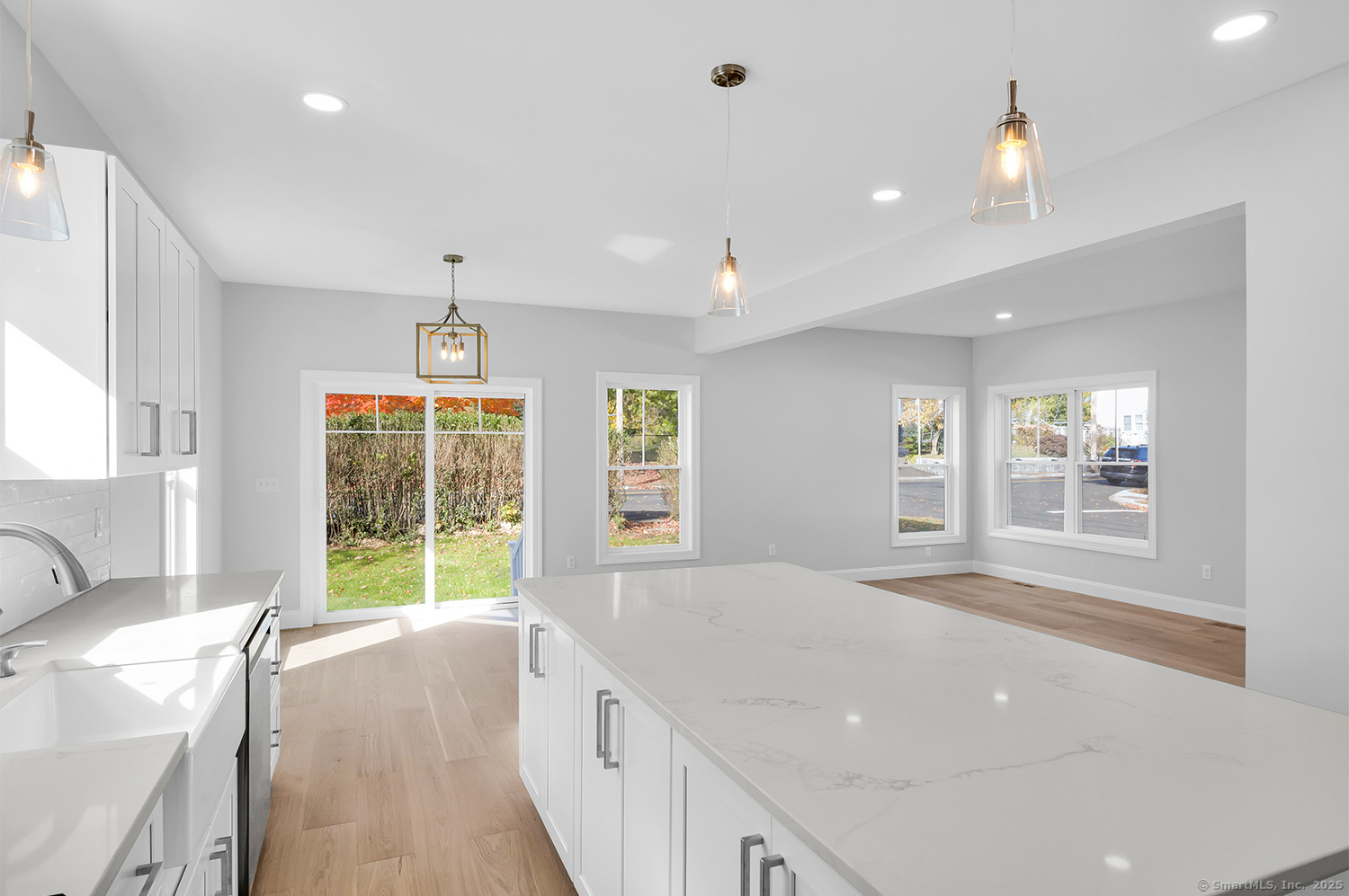 197 Vesper Street Fairfield, CT 06825 - Photo 7 of 21 a spacious bedroom with a balcony a bed and a window