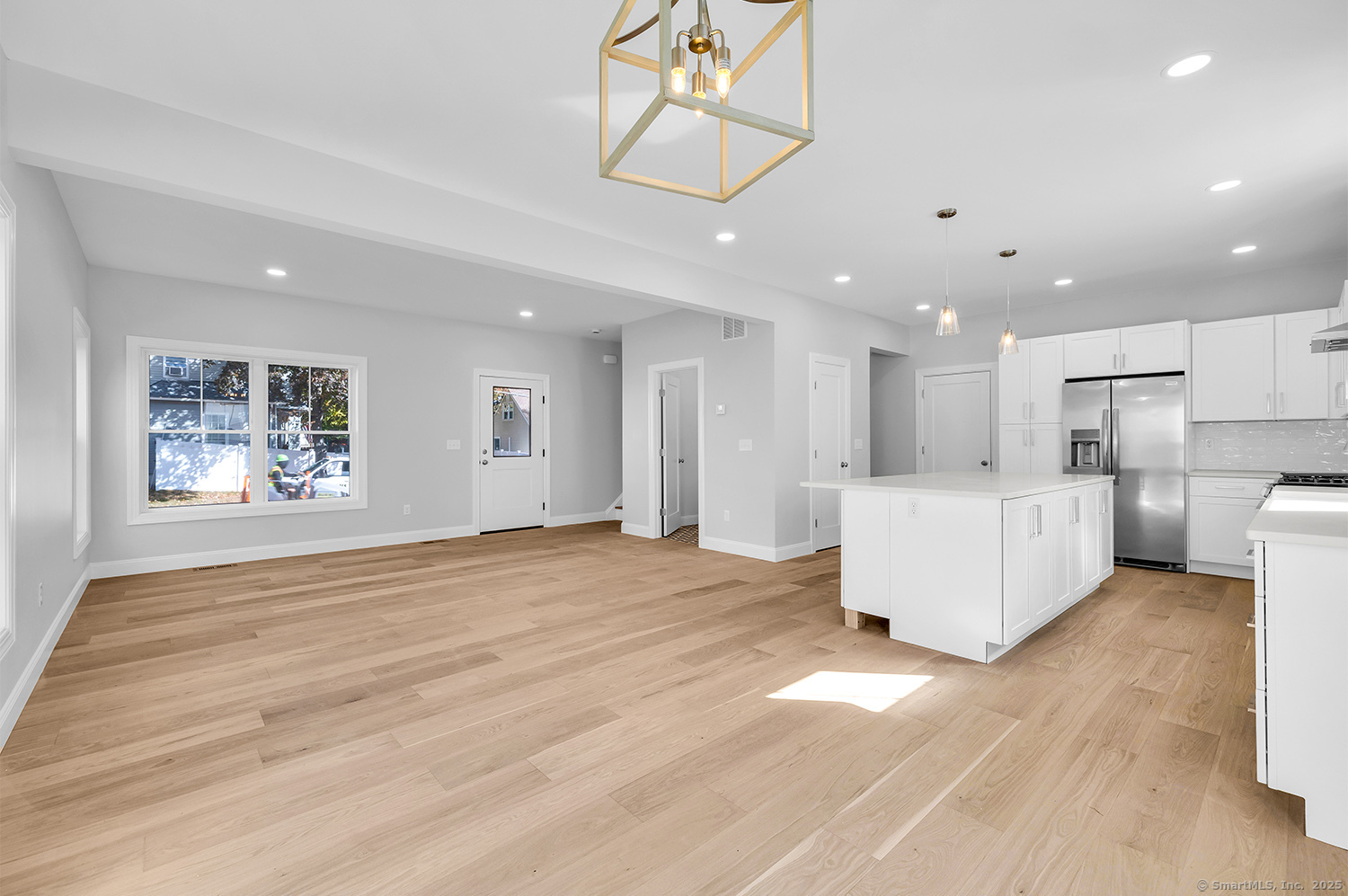 197 Vesper Street Fairfield, CT 06825 - Photo 8 of 21 a large white kitchen with a large window