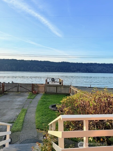27728 Manzanita Beach Road Southwest Vashon, WA 98070 - Photo 3 of 17 a view of a balcony with an outdoor space