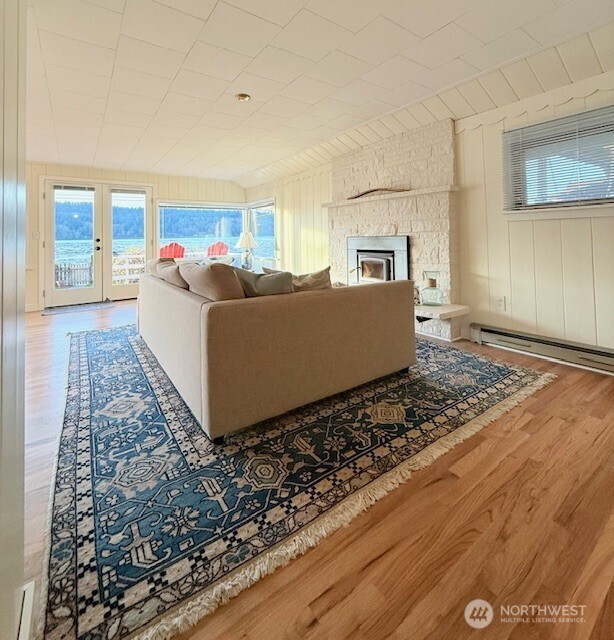 27728 Manzanita Beach Road Southwest Vashon, WA 98070 - Photo 8 of 17 a living room with furniture and a window