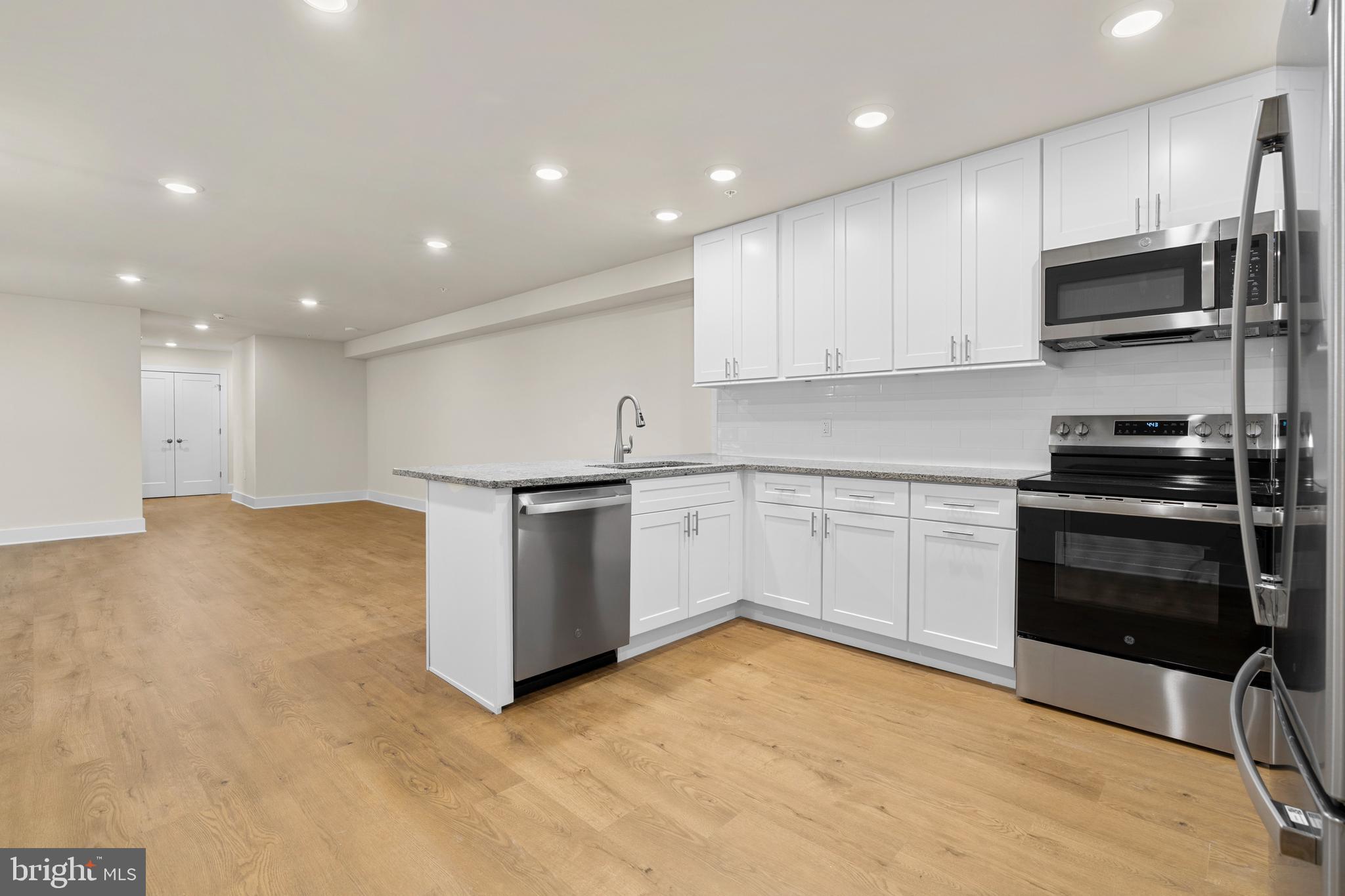 30 West Broad Street Souderton, PA 18964 - Photo 1 of 41 a kitchen with a sink stainless steel appliances and cabinets