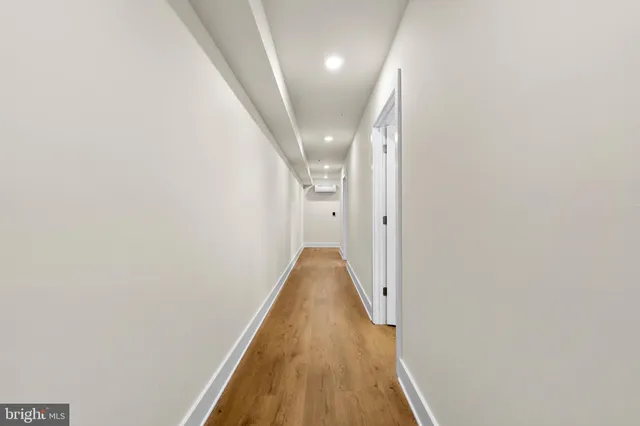 a view of a room with racks on the wall