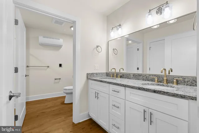 an empty room with a empty space and windows