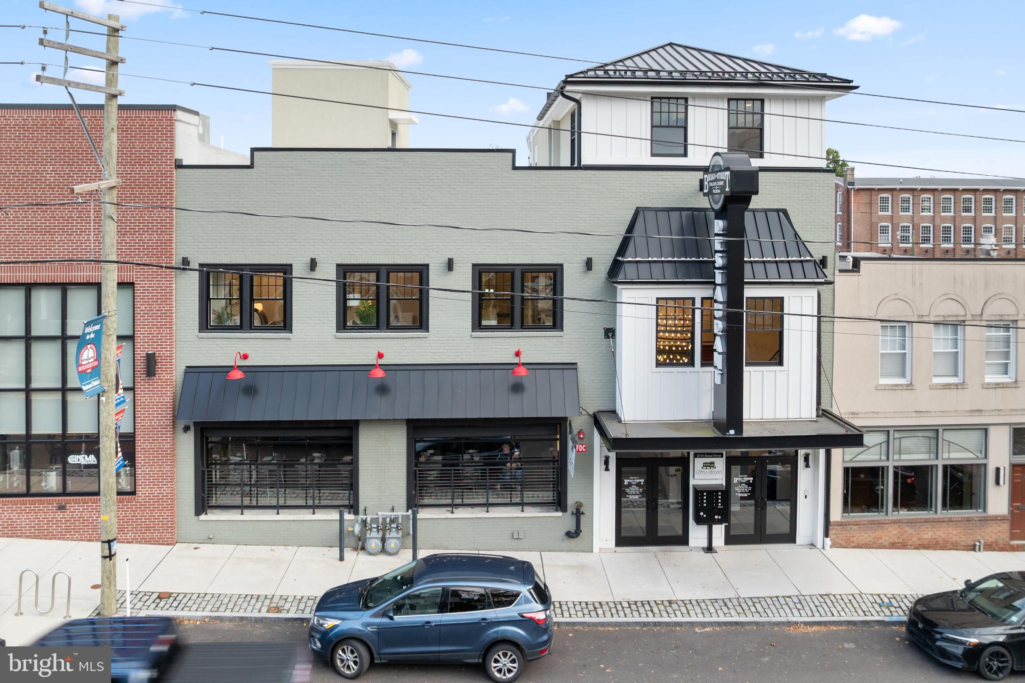 30 West Broad Street Souderton, PA 18964 - Photo 39 of 41 a car parked in front of a building