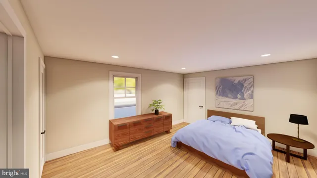 a view of room with window and wooden floor