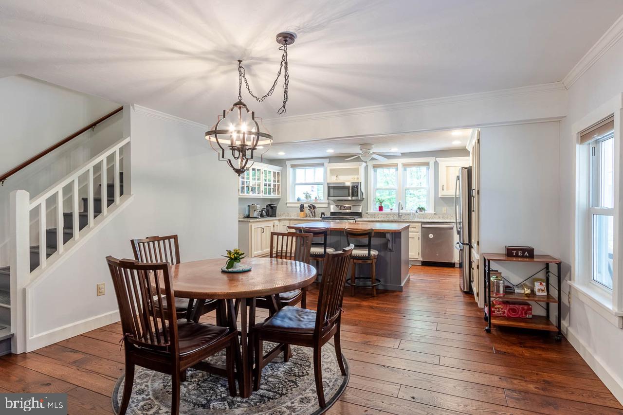 1834 Decker Hollow Road Tyrone, PA 16686 - Photo 15 of 40 a view of a dining room with furniture wooden floor and chandelier