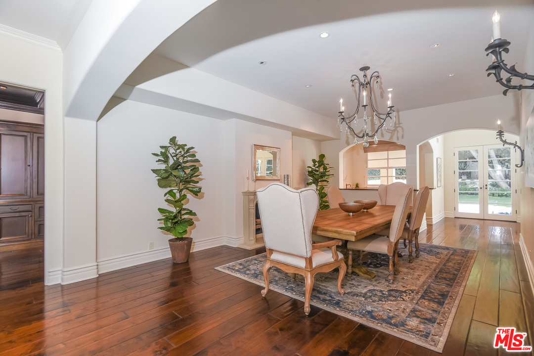 3901 Longridge Avenue Sherman Oaks, CA 91423 - Photo 18 of 51 a view of a dining room with furniture window and wooden floor