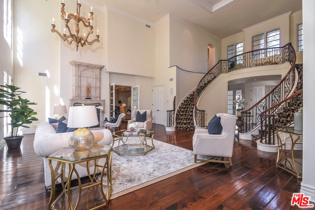 3901 Longridge Avenue Sherman Oaks, CA 91423 - Photo 4 of 51 a living room with furniture and a table