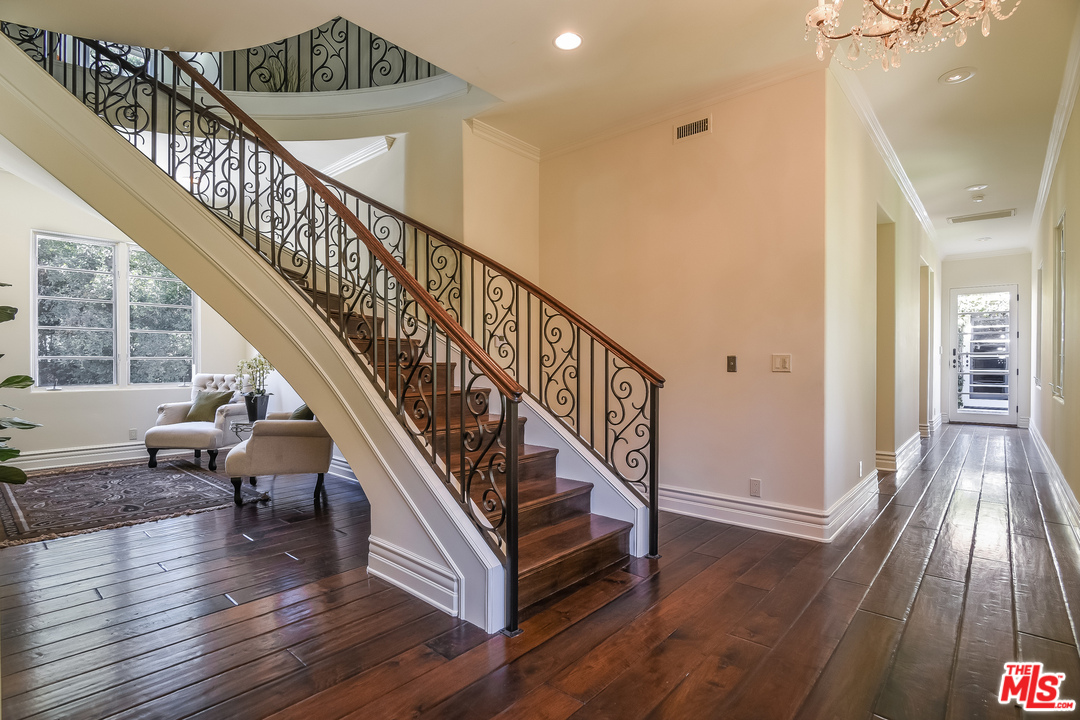 3901 Longridge Avenue Sherman Oaks, CA 91423 - Photo 34 of 51 a view of entryway and hall with wooden floor
