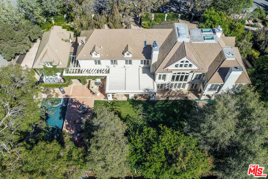 3901 Longridge Avenue Sherman Oaks, CA 91423 - Photo 10 of 51 an aerial view of multiple house with a yard and trees