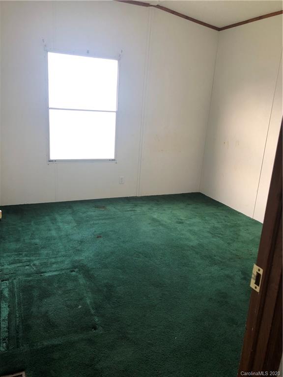 140 Rithmetic Road Salisbury, NC 28147 - Photo 14 of 18 a view of an empty room with a window