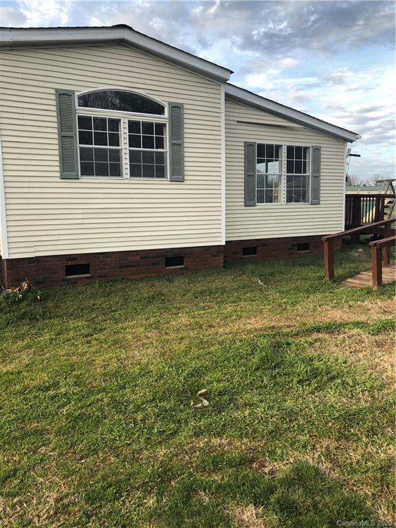 140 Rithmetic Road Salisbury, NC 28147 - Photo 3 of 18 a backyard of a house
