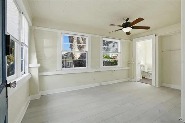 a view of an empty room with a window