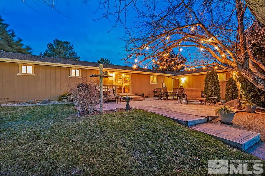 14405 Rim Rock Drive Reno, NV 89521 - Photo 28 of 39 a view of a backyard with sitting area