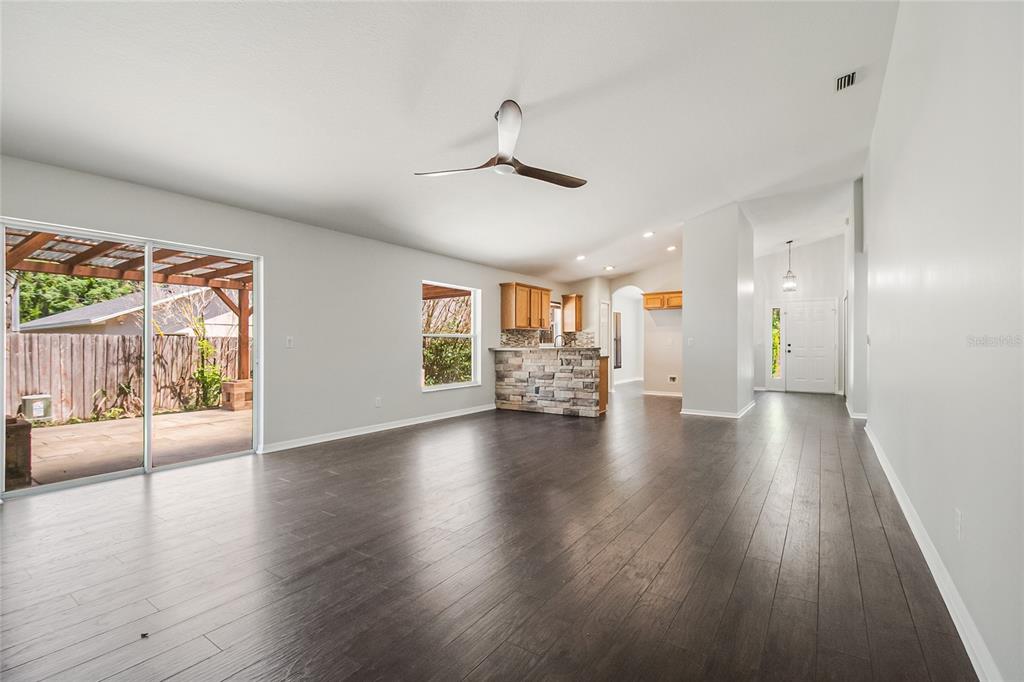 221 Rosa Avenue Oviedo, FL 32765 - Photo 14 of 36 a view of a livingroom with furniture wooden floor and a window