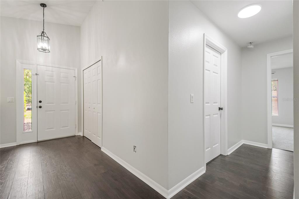 221 Rosa Avenue Oviedo, FL 32765 - Photo 16 of 36 a view of a room with wooden floor
