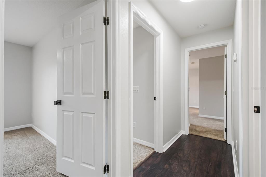 221 Rosa Avenue Oviedo, FL 32765 - Photo 18 of 36 a view of a bathroom with wooden floor