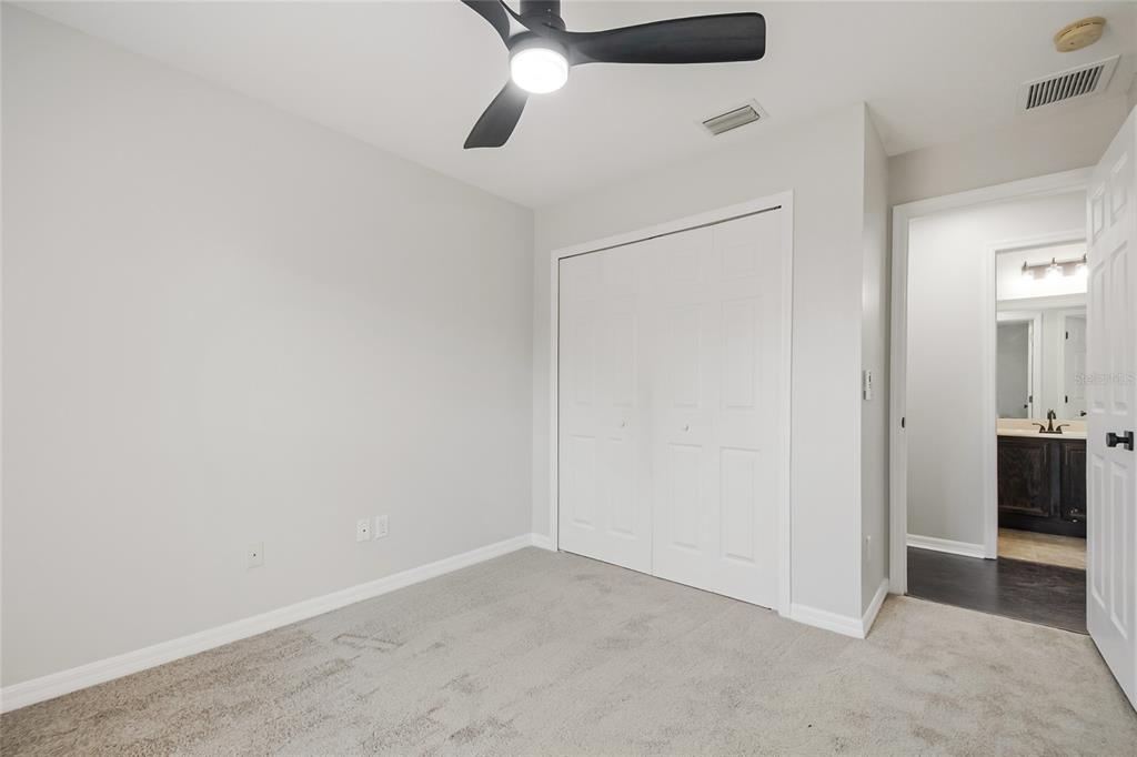 221 Rosa Avenue Oviedo, FL 32765 - Photo 24 of 36 an empty room with a kitchen