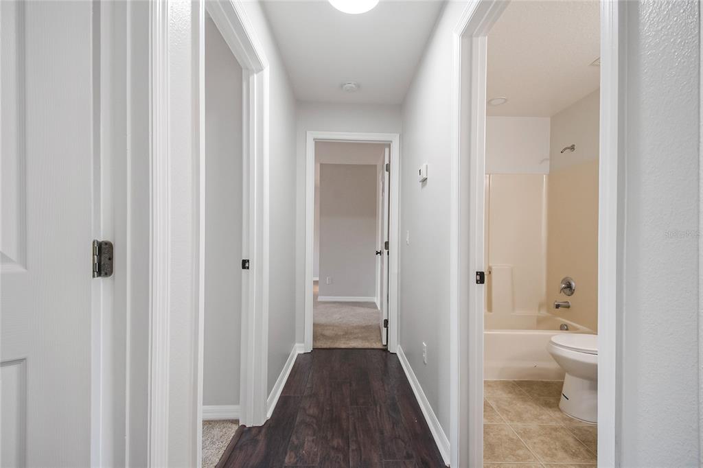 221 Rosa Avenue Oviedo, FL 32765 - Photo 25 of 36 a view of a bathroom from a hallway