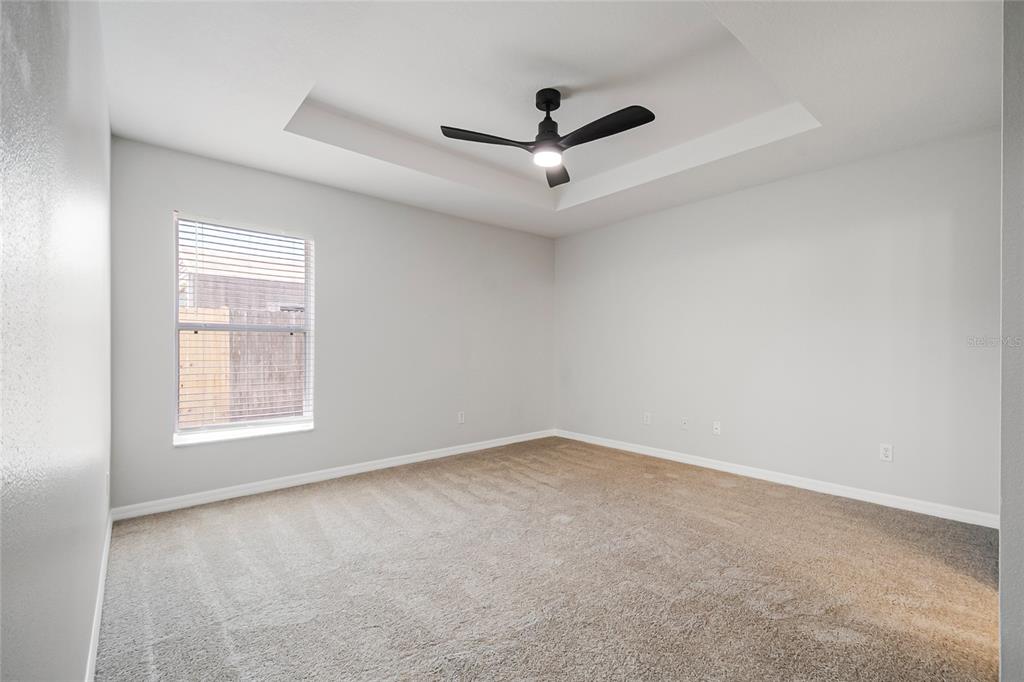 221 Rosa Avenue Oviedo, FL 32765 - Photo 26 of 36 an empty room with a window and a ceiling fan
