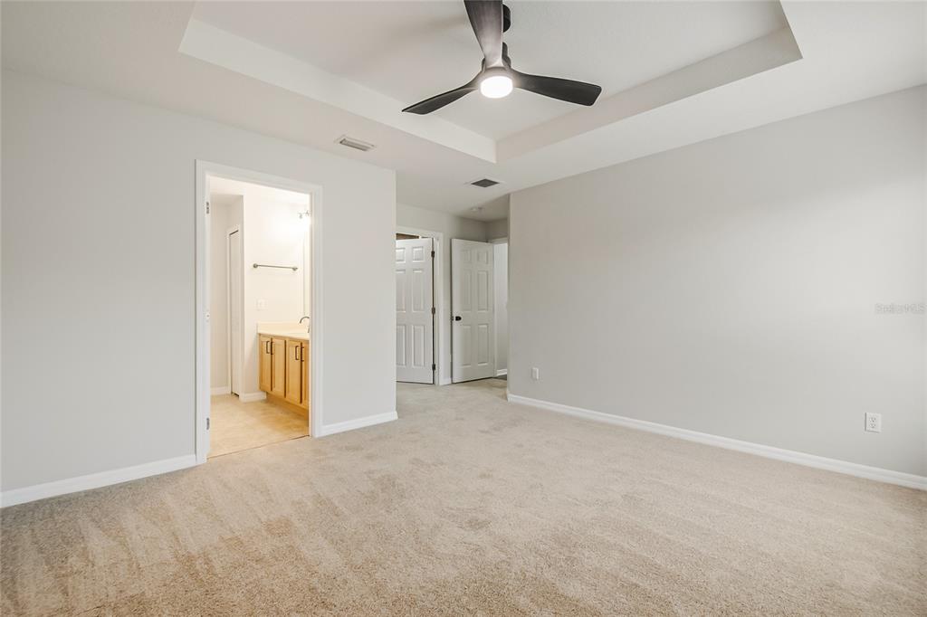 221 Rosa Avenue Oviedo, FL 32765 - Photo 29 of 36 an empty room with chandelier fan