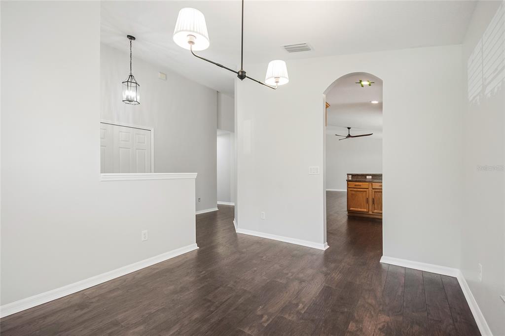 221 Rosa Avenue Oviedo, FL 32765 - Photo 9 of 36 a view of a room with wooden floor and bathroom