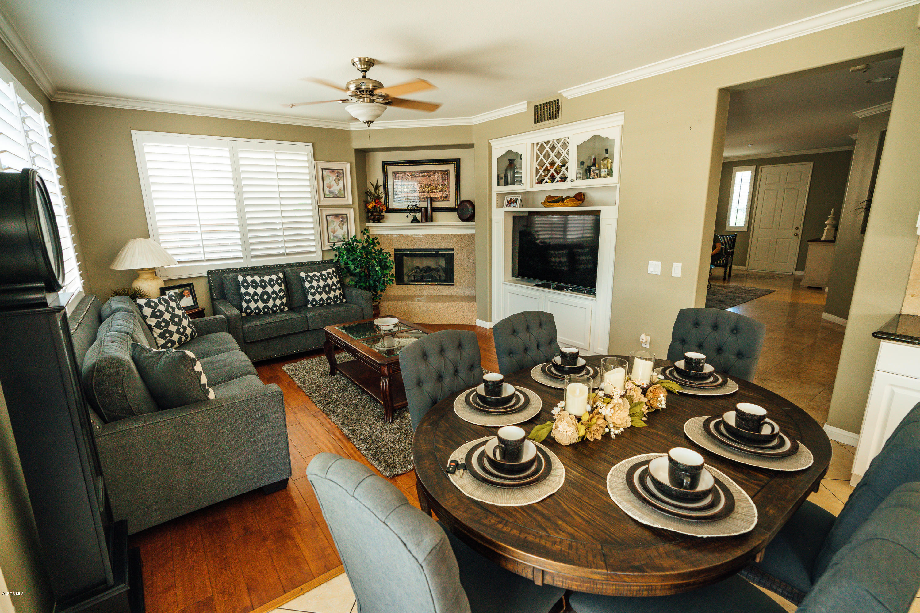 2103 Ribera Drive Oxnard, CA 93030 - Photo 8 of 24 a living room with furniture and a flat screen tv